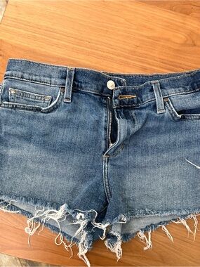 Joe’s Ozzie 4” Frayed Hem Mid-Blue Denim Shorts.